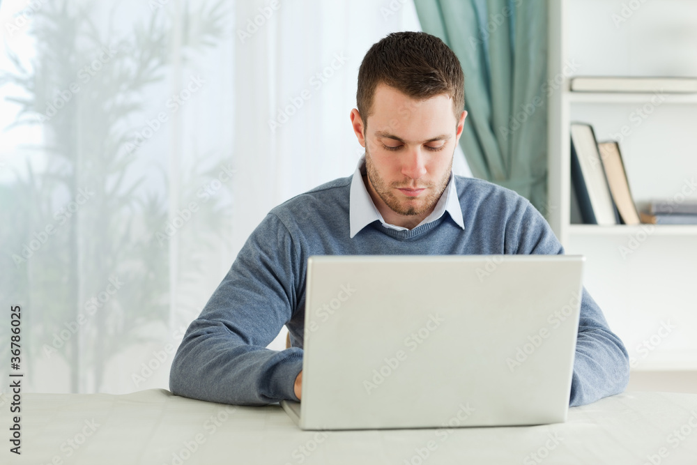 Businessman working in his homeoffice Businessman working in his homeoffice
