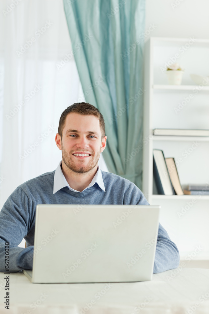 Smiling businessman in his homeoffice Smiling businessman in his homeoffice