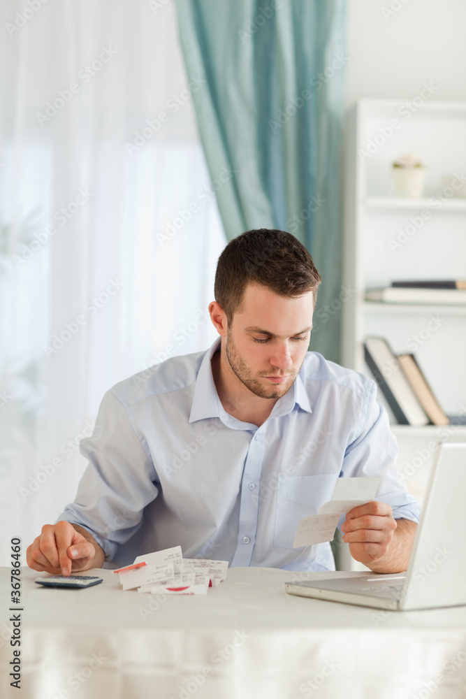 Businessman doing his calculations Businessman doing his calculations