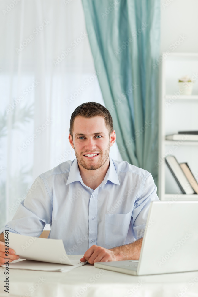 Businessman happy about a letter Businessman happy about a letter
