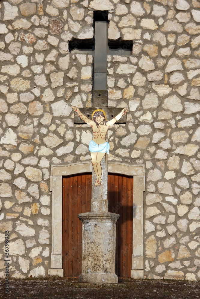 Crucifix before a chapel