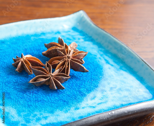 Star Anise on a Blue Ceramic Plate