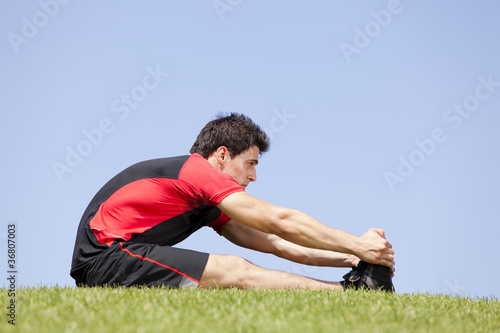 Athlete warming and stretching