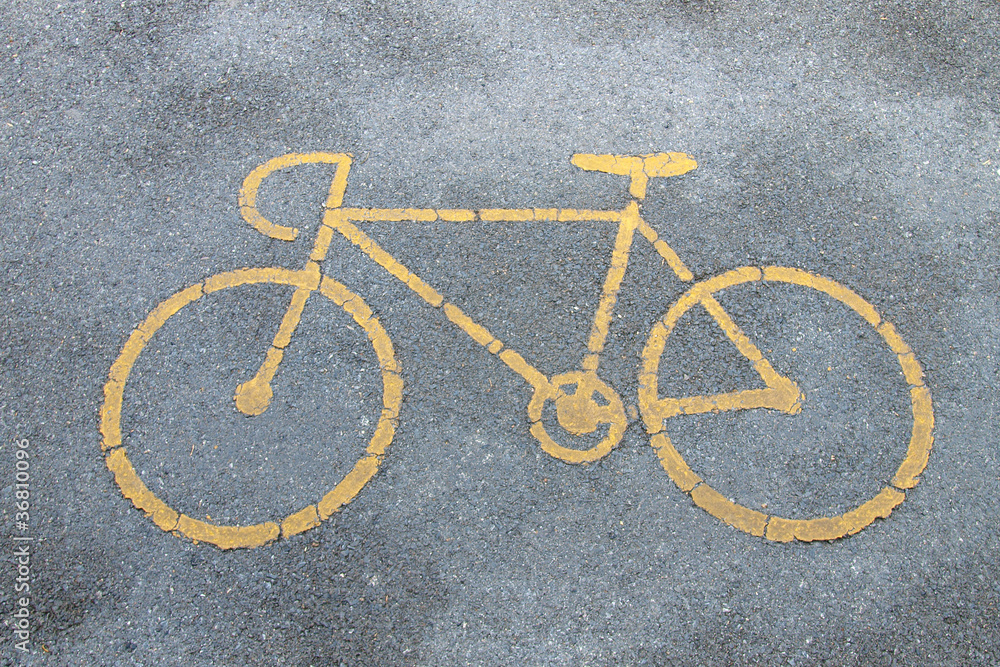Bicycle road sign painted on the pavement Bicycle road sign painted on the pavement