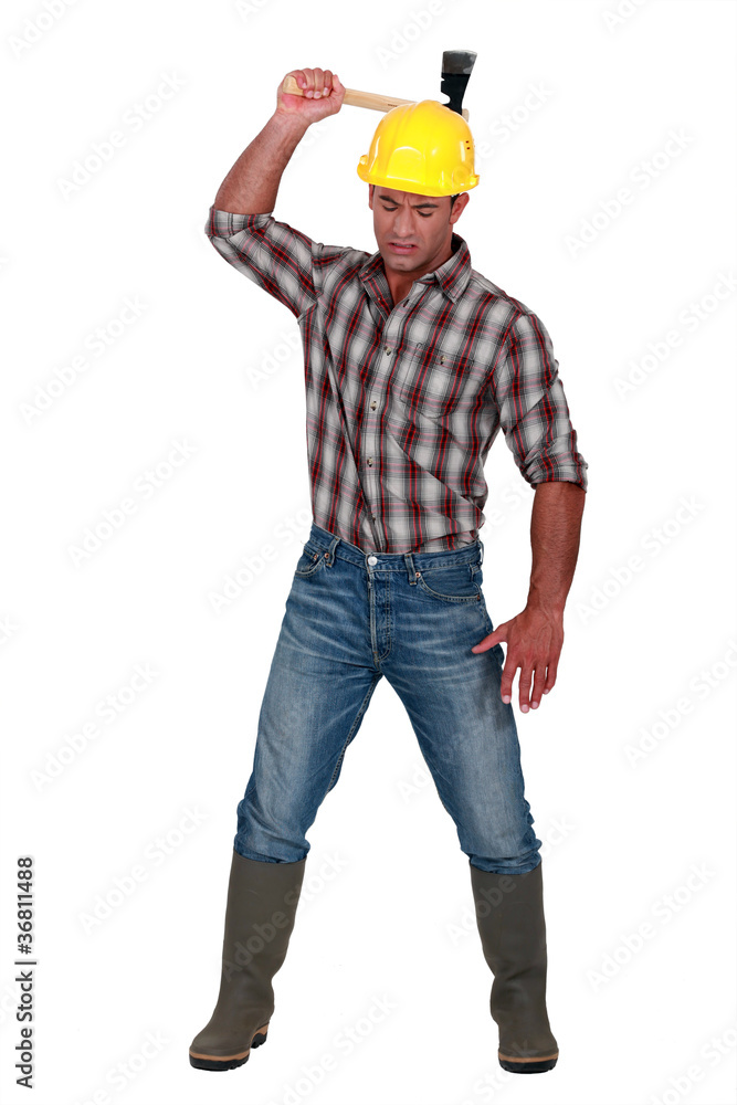 Laborer using an ax Laborer using an ax