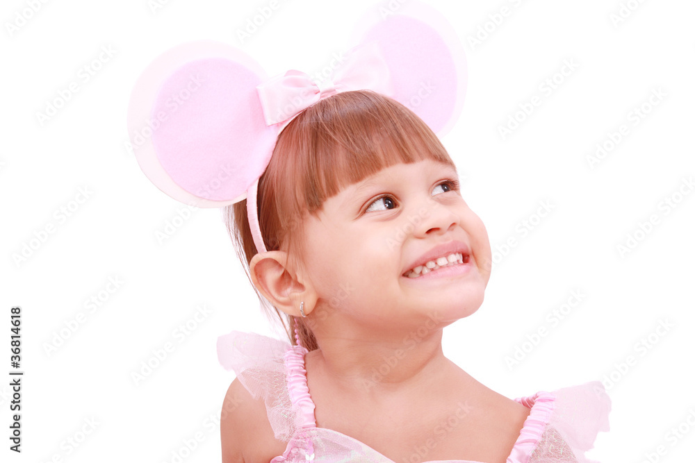 little girl wearing mouse`s ears laugh