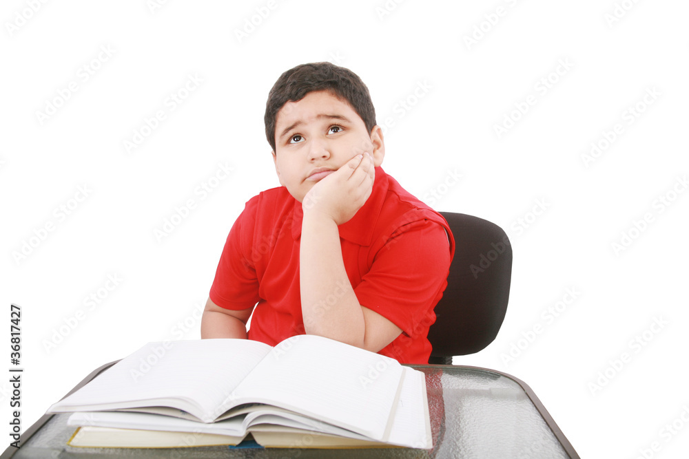 Portrait of a stressed young student with a of books to read. Portrait of a stressed young student with a of books to read.