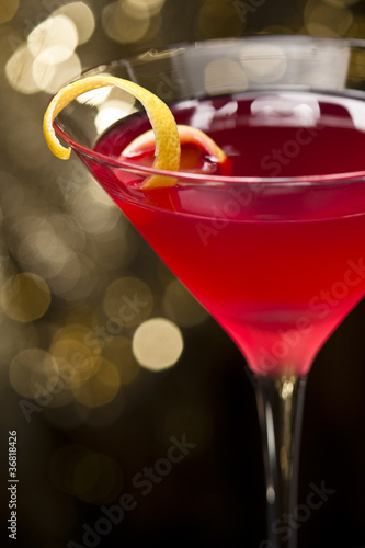 Cosmopolitan cocktail with lemon garnish
