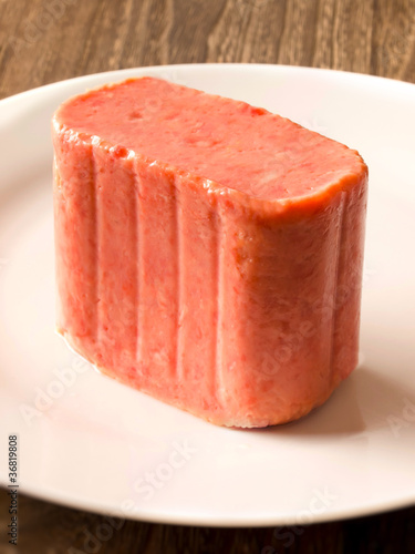 close up of a slab of spam on a plate