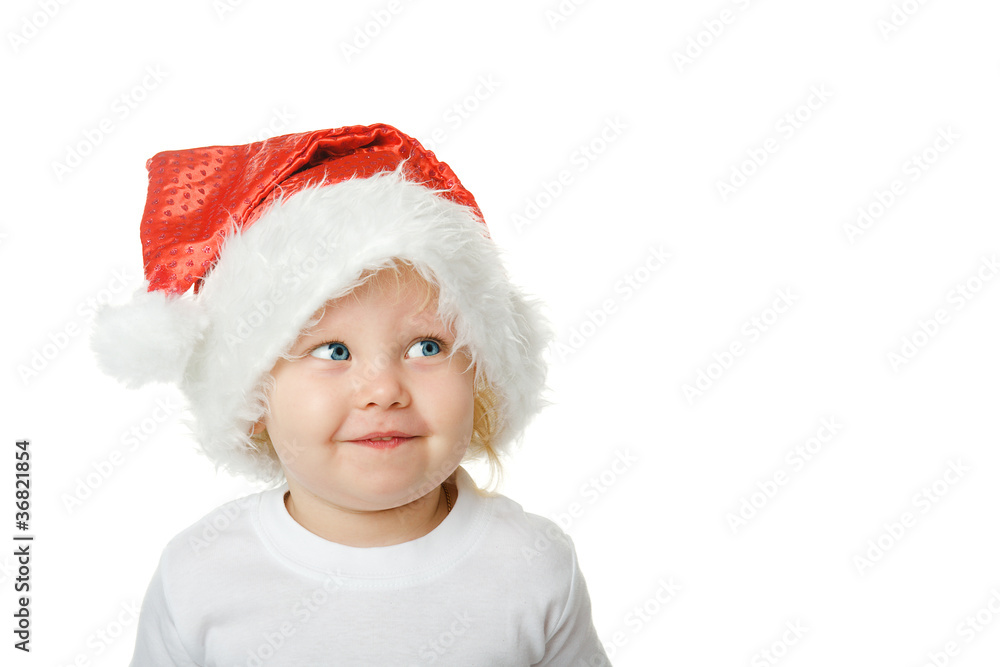Christmas kid in Santa hat isolated on white background Christmas kid in Santa hat isolated on white background