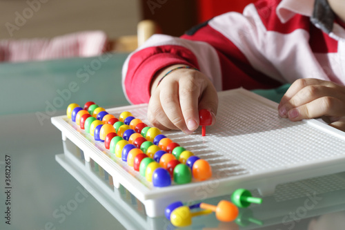 Child playing close up hands