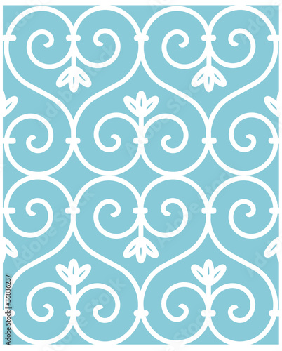 iron gate with swirls on blue background