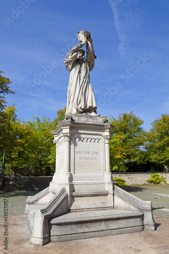 Guillaume Farel Statue in Neuchatel photo