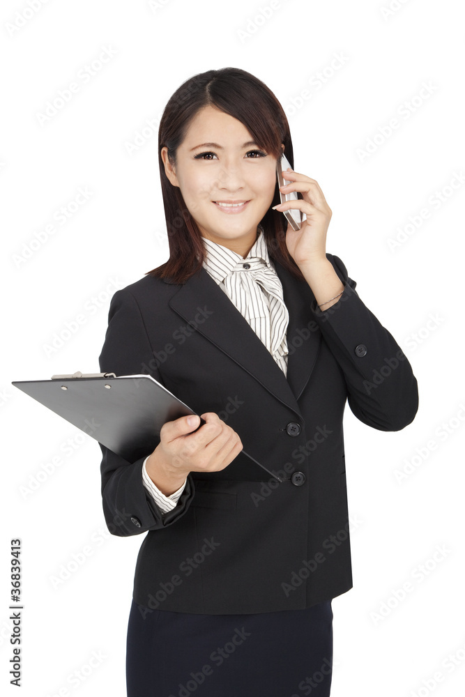 asian business woman using phone and holding a folder asian business woman using phone and holding a folder