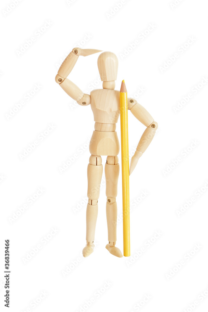 Wooden figure holding yellow pencil and looking Wooden figure holding yellow pencil and looking