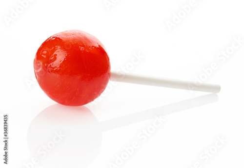 Red lollipop on white