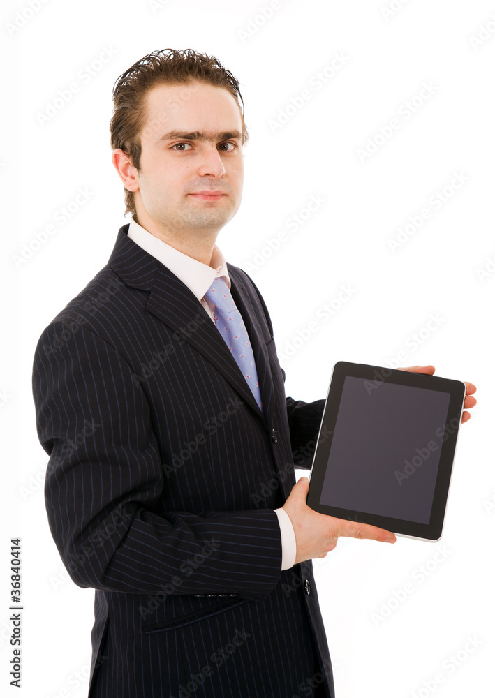 Smiling young business man showing tablet pc. Isolated over whit Smiling young business man showing tablet pc. Isolated over whit