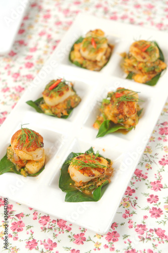 Scallops on a plate decorated