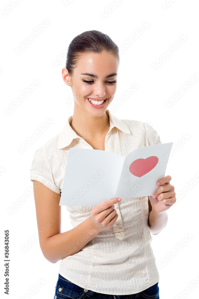 Young happy woman with valentine card, isolated Young happy woman with valentine card, isolated