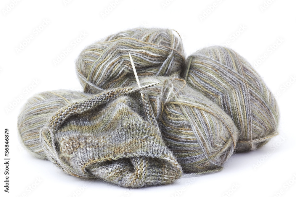 Woollen thread and knitting needle. Woollen thread and knitting needle.