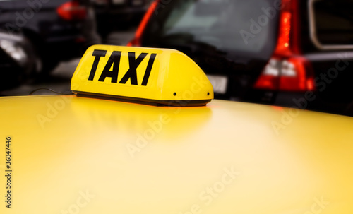 taxi sign yellow