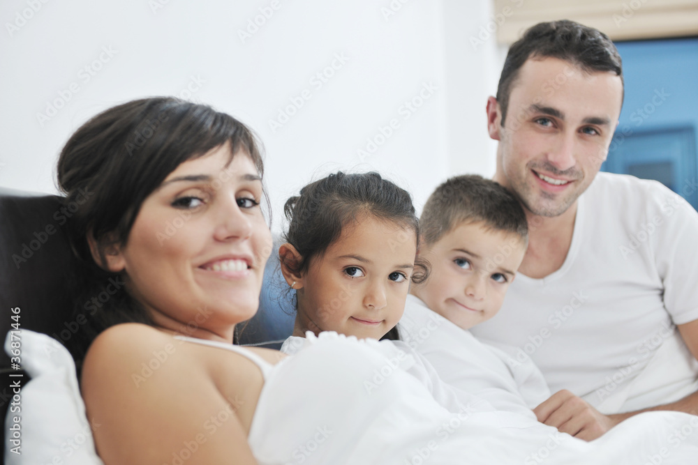 happy young Family in their bedroom happy young Family in their bedroom