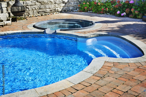 Fényképezés Swimming pool with hot tub