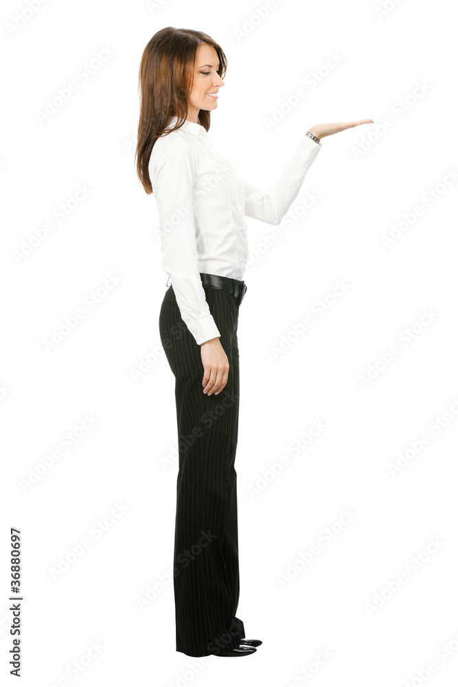 Business woman showing something, isolated Business woman showing something, isolated