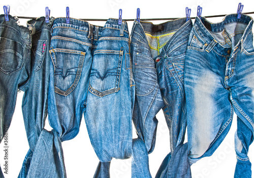 Some blue jeans drying on washing line