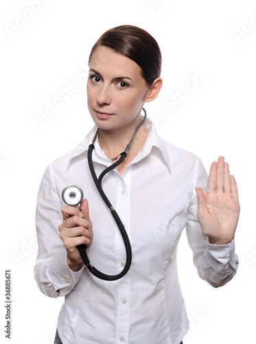 Medical female doctor showing stop gesture