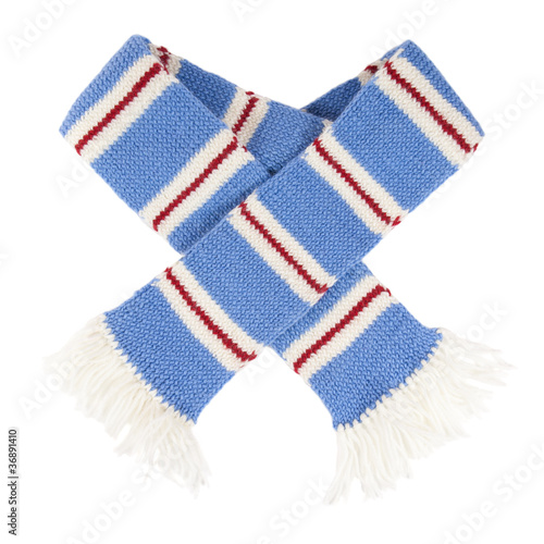 Warm knitted scarf and hat with stripes isolated