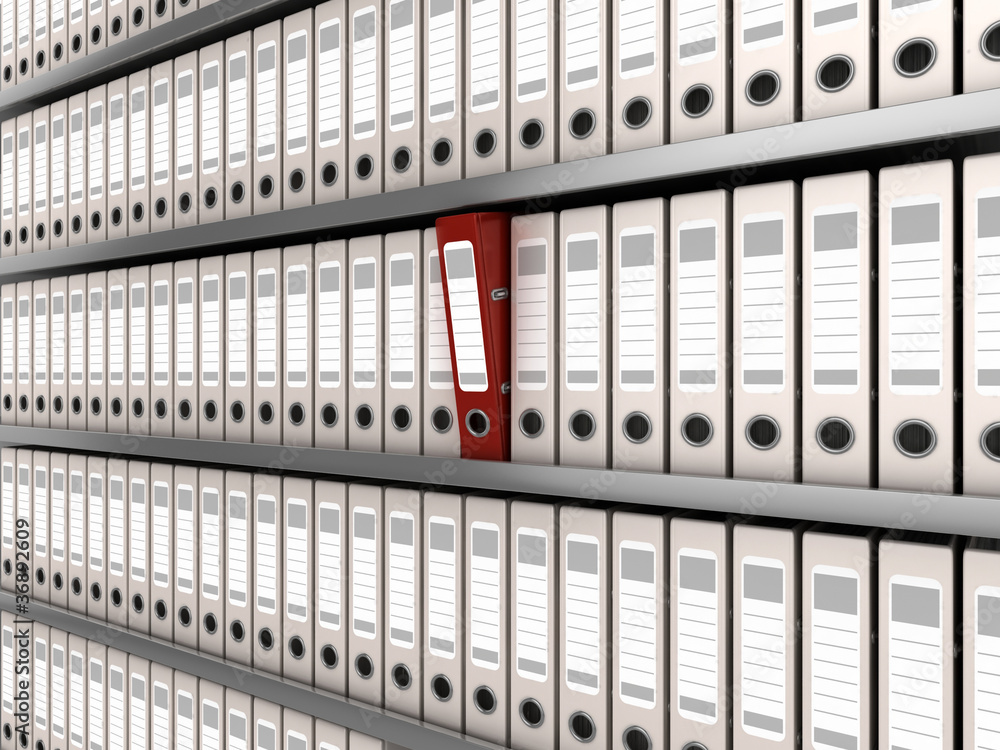 red ring binder standing out from a row of files red ring binder standing out from a row of files