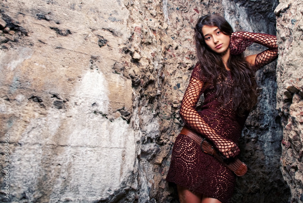 Happy young model next to concrete. Happy young model next to concrete.