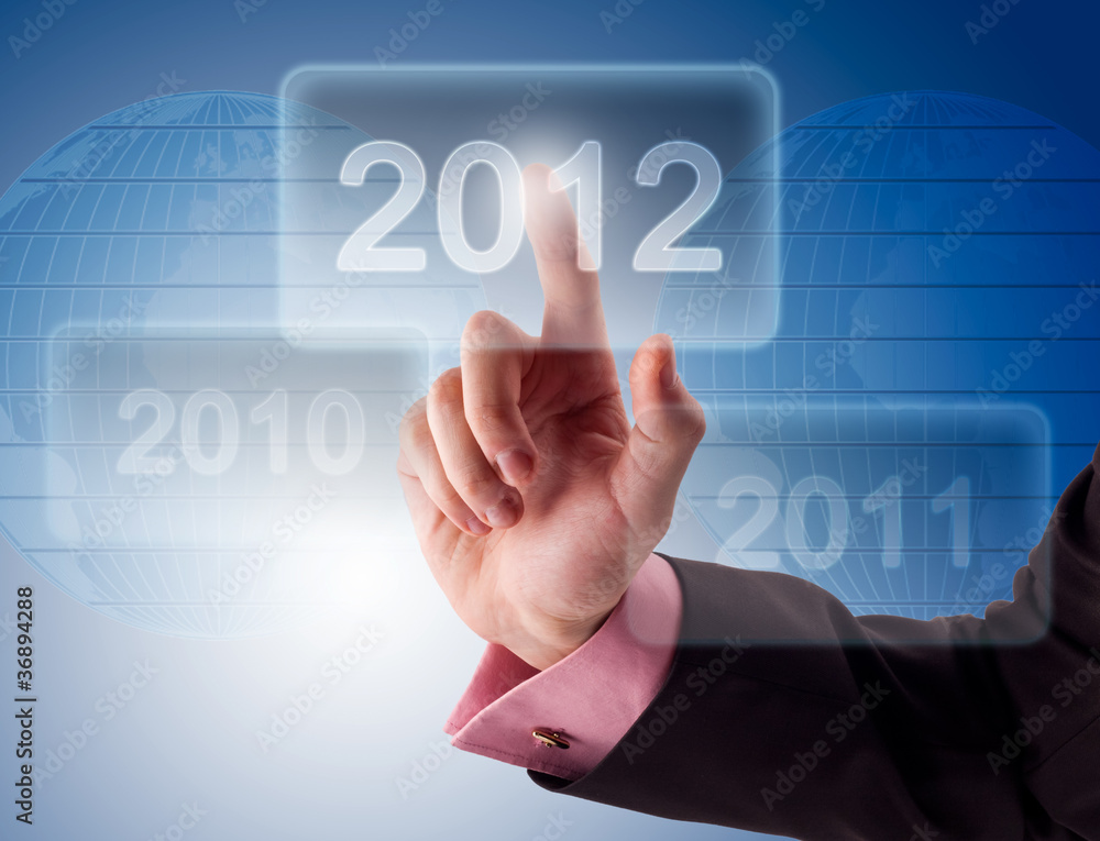 Businessman pressing button New Year Businessman pressing button New Year
