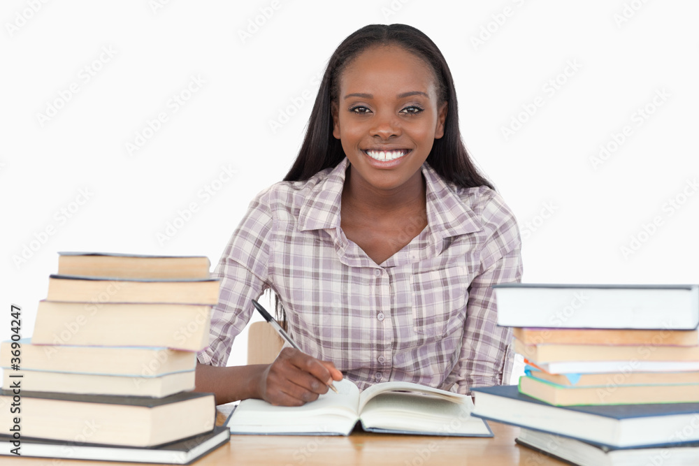 Smiling girl studying Smiling girl studying