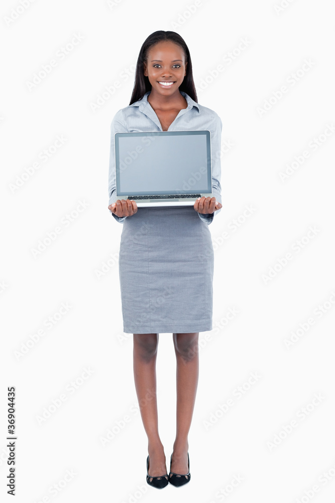 Portrait of a cute businesswoman showing a laptop Portrait of a cute businesswoman showing a laptop