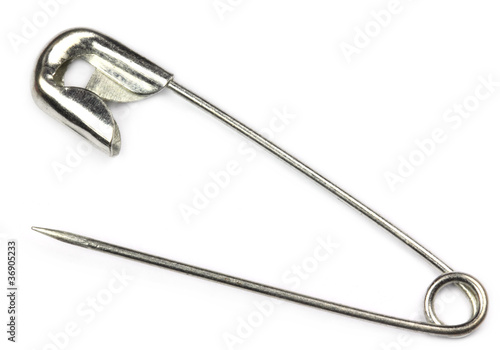 Safety Pin over white background