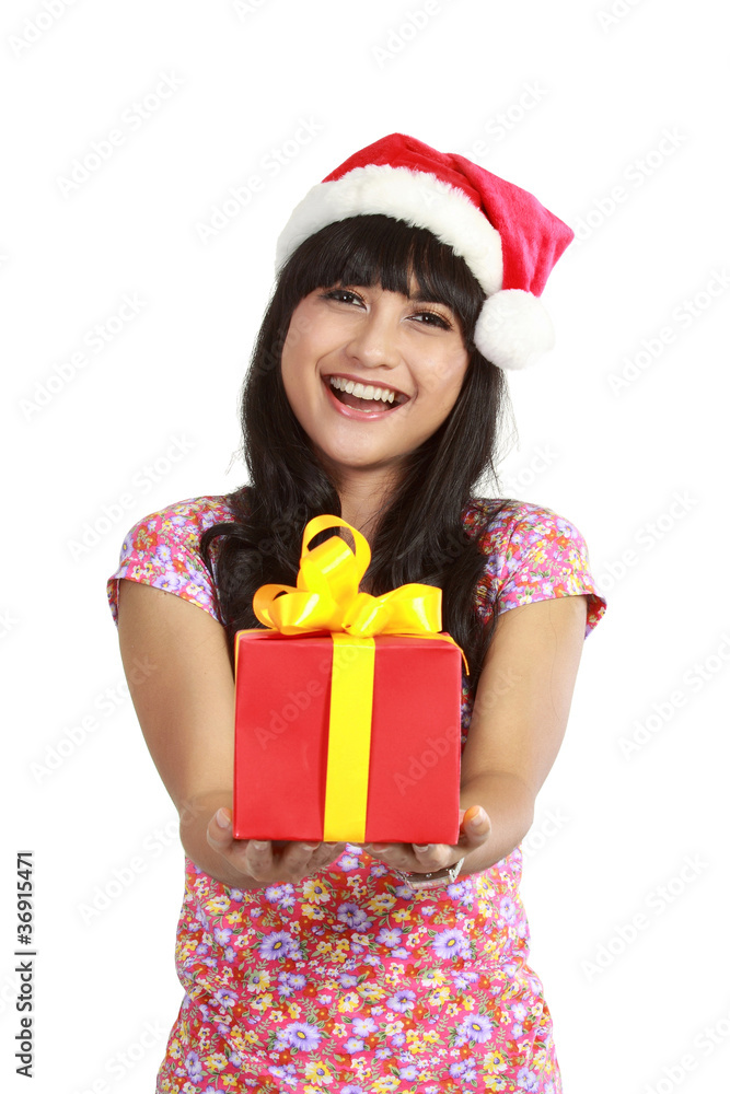 asian woman wearing Santa hat holding a gift asian woman wearing Santa hat holding a gift