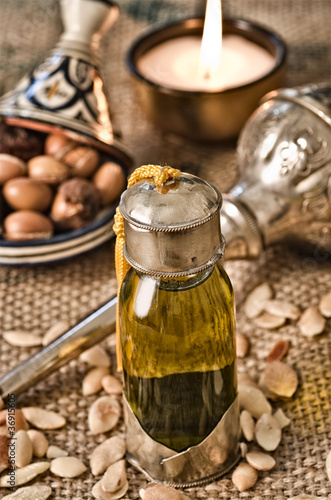 Still life of argan oil with fruits
