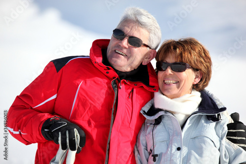 old couple skiing