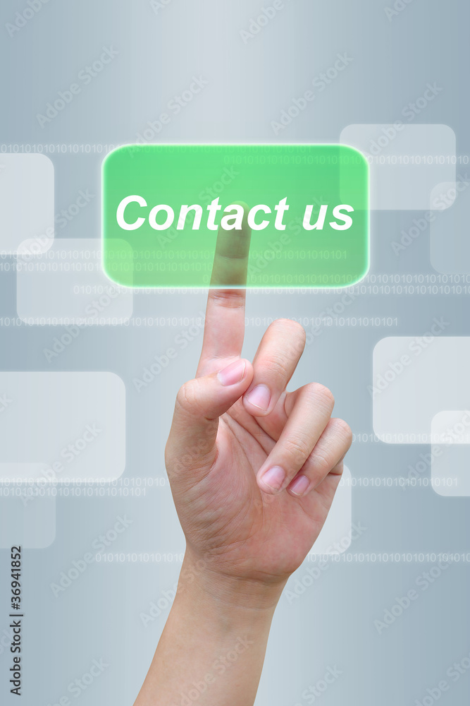 hand pushing contact us button on a touch screen interface hand pushing contact us button on a touch screen interface