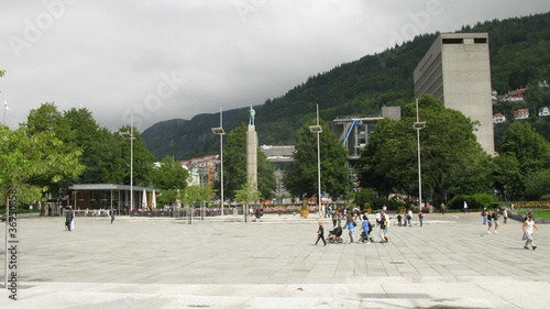 People pass through plaza in Norwegian town, time lapse photo