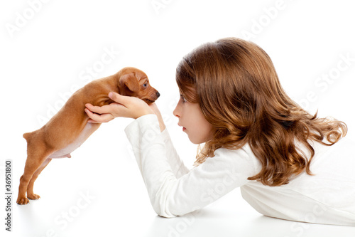 Brunette profile girl with dog puppy mini pinscher photo