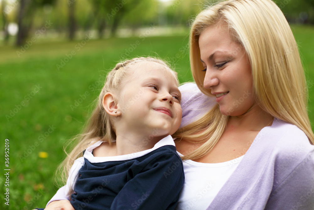 Mother and daughter in park Mother and daughter in park