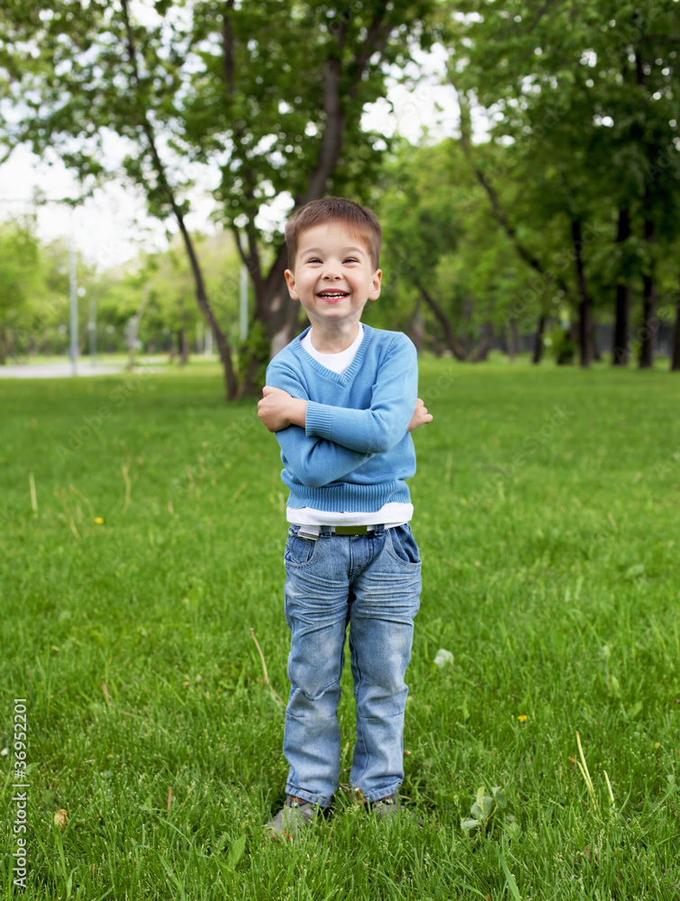 Portrait of a little boy outdoors