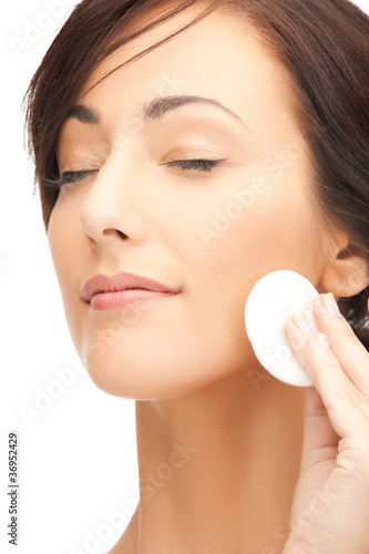 beautiful woman with cotton pad