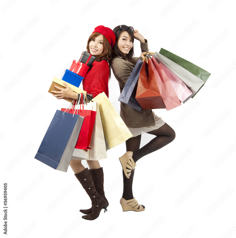 happy asian fashion girls holding shopping bag and gift