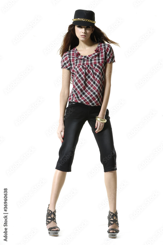 Full length casual young fashion woman wearing hat posing Full length casual young fashion woman wearing hat posing