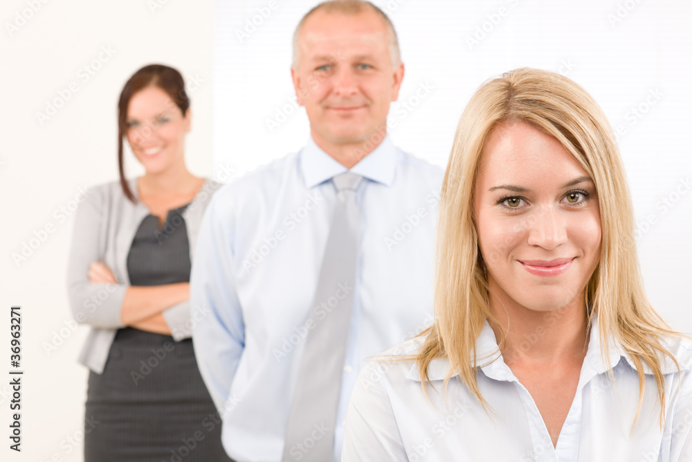 Business team happy standing in line portrait Business team happy standing in line portrait