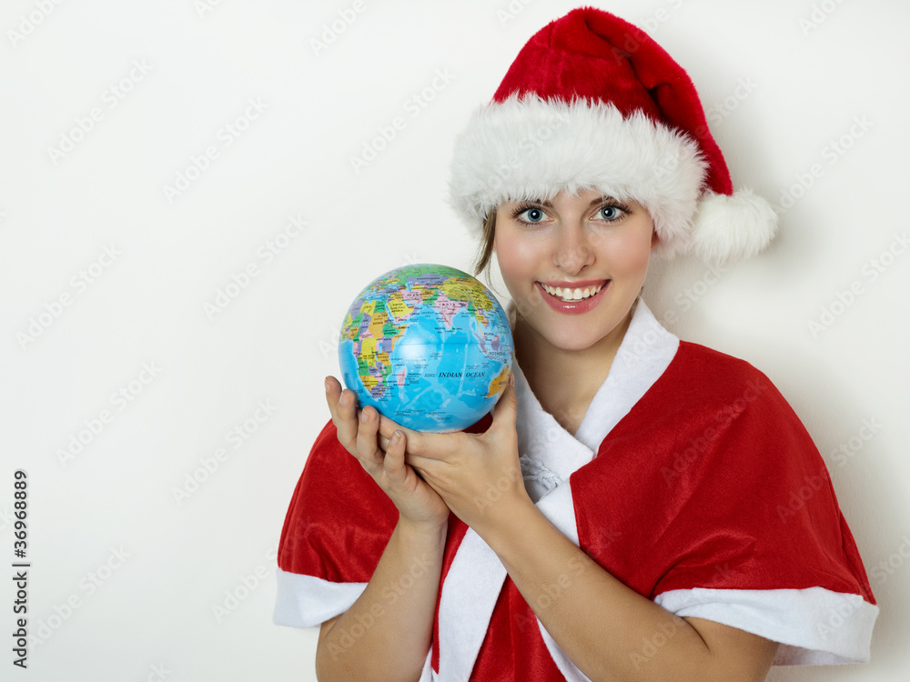 Young Miss Santa brings Christmas to the whole world Young Miss Santa brings Christmas to the whole world